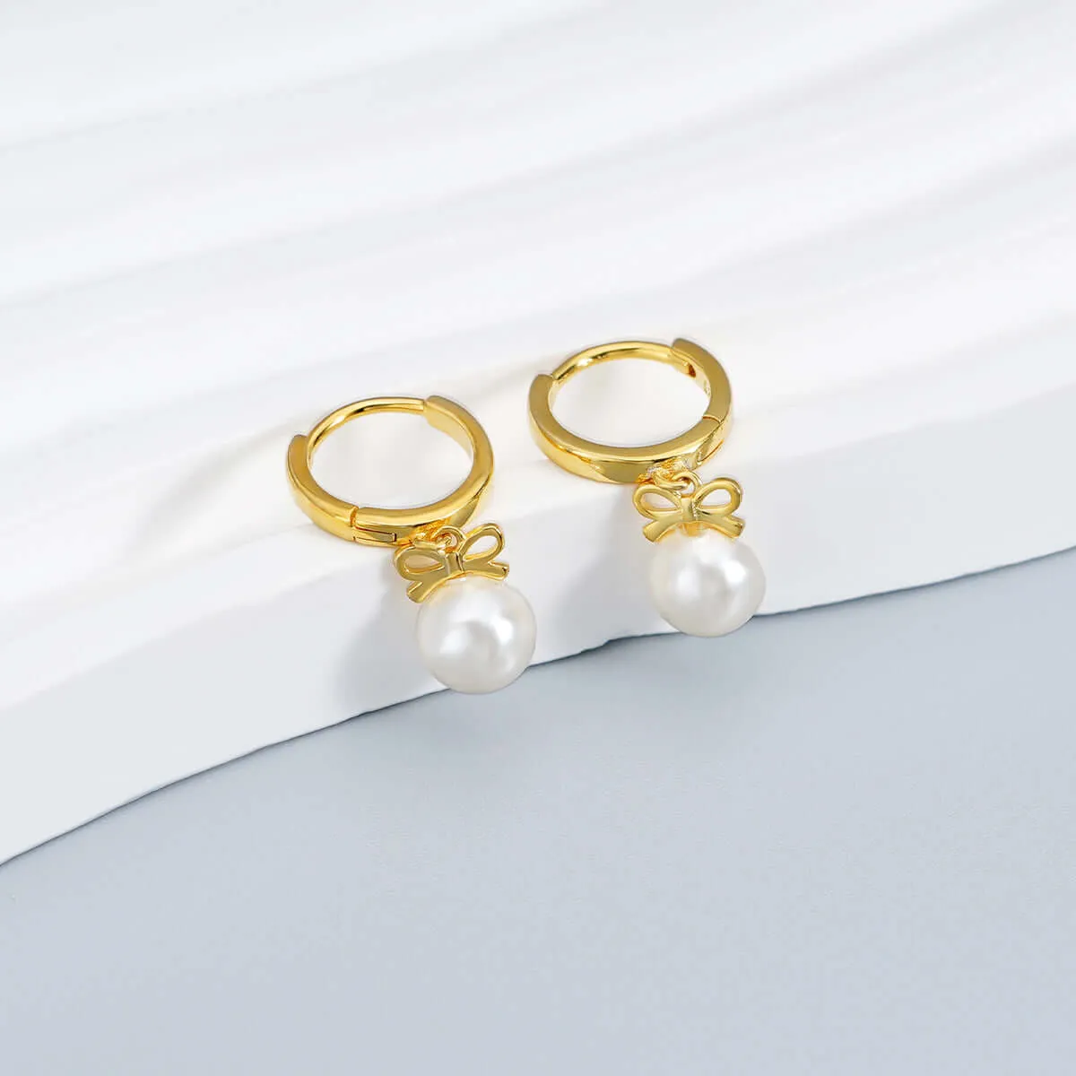 925 Silver Bow Pearl Huggie Earrings